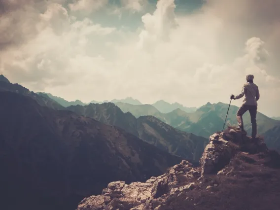 woman on mountain peak