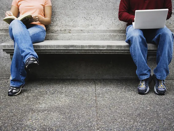 people sitting on bench