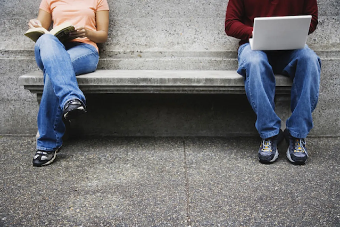 people sitting on bench